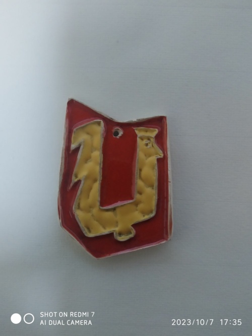 pendentif au coq,