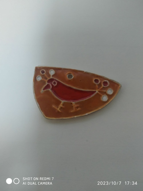 pendentif à l'oiseau